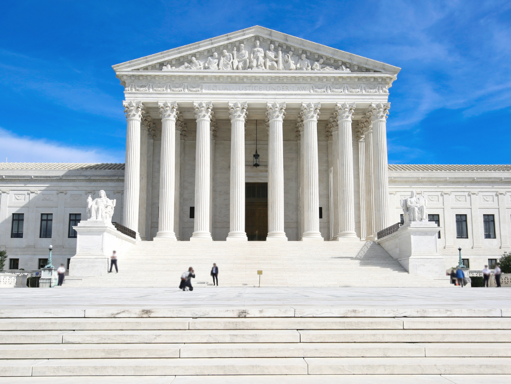 The United States Supreme Court building, with its grand columns and steps.