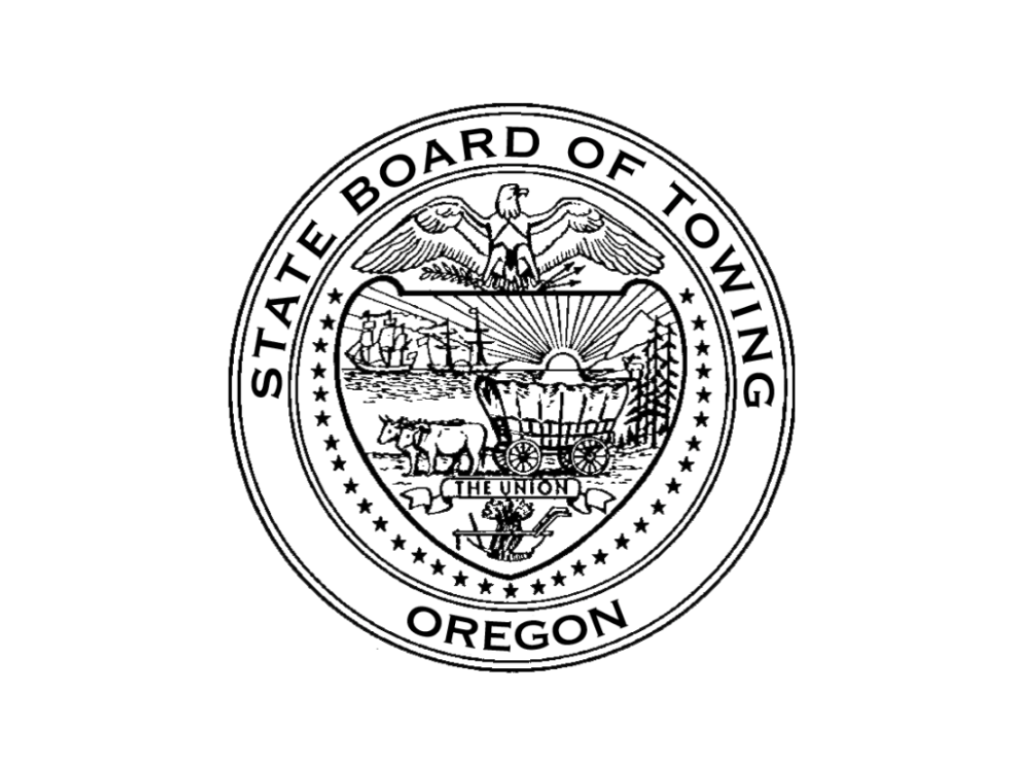 State of Oregon Board of Towing seal, featuring an eagle above a shield with a covered wagon, trees, and a sun. 