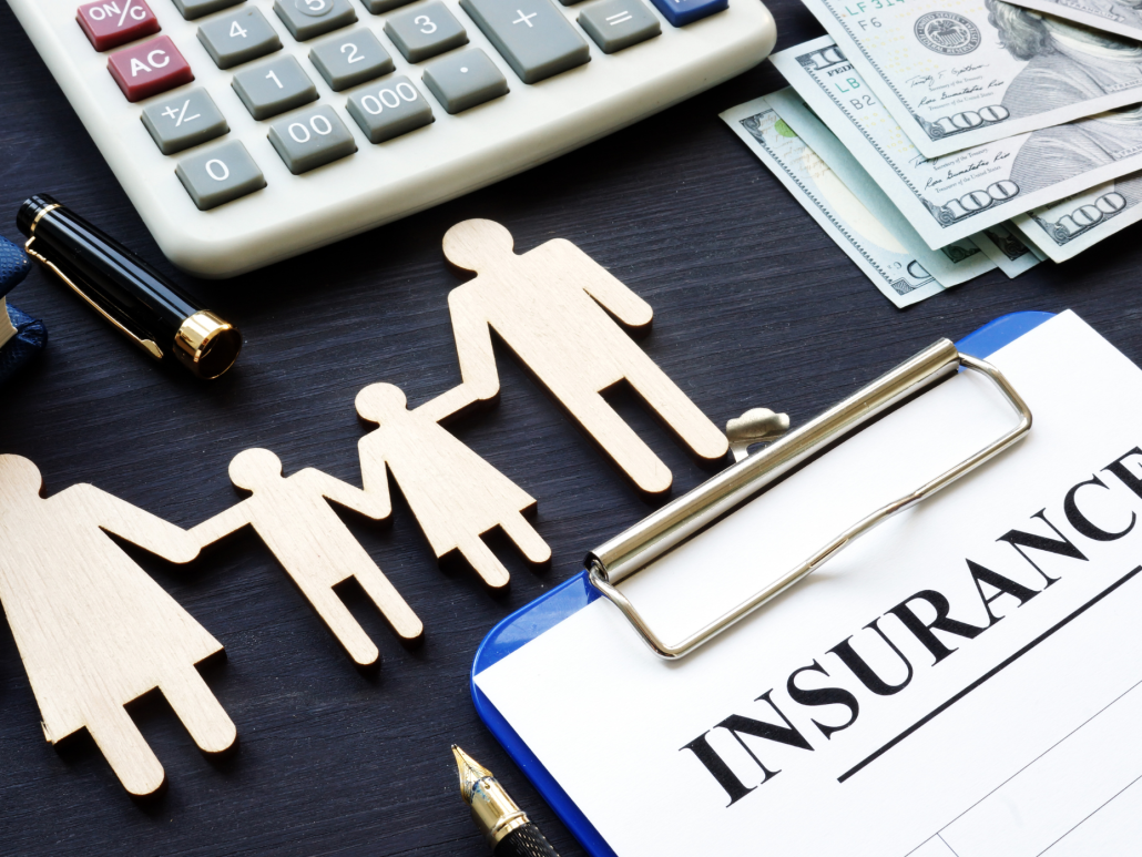   A clipboard with a piece of paper reading 'insurance'.