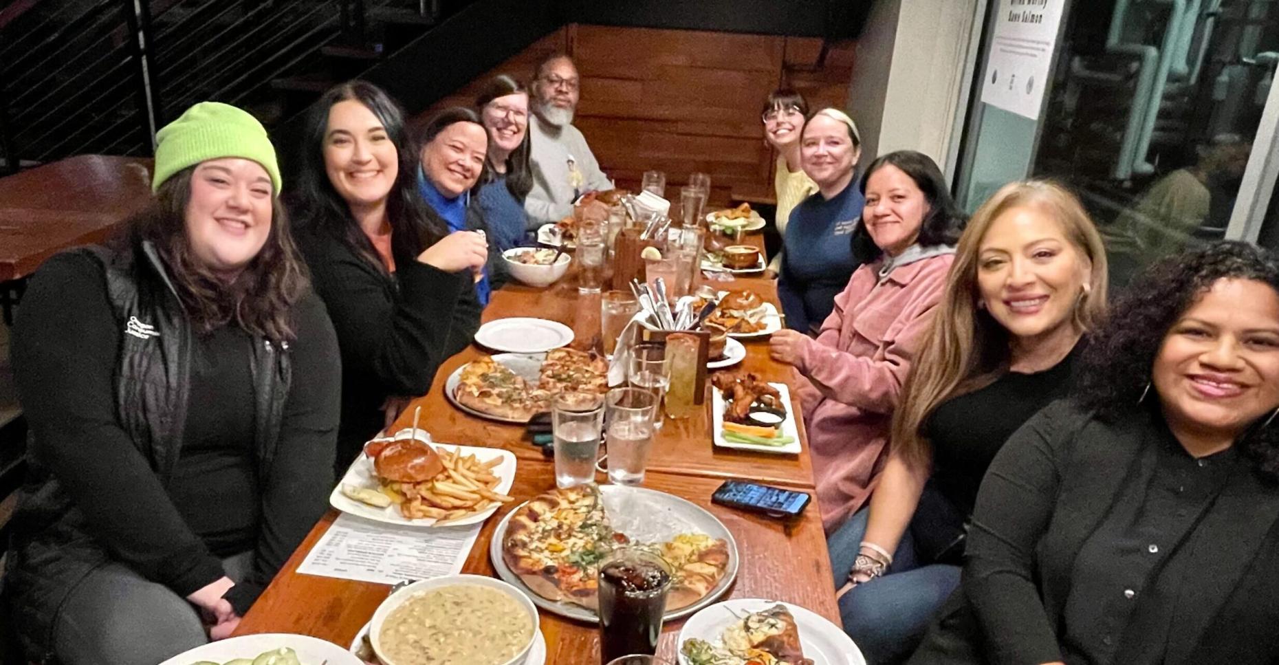 Cohort members and OCJ staff at dinner together